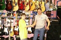 Josh with Rick at Sticks and Strings